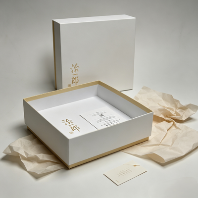 Bon prix Boîtes d'emballage de chocolat de style japonais minimaliste et élégant, avec pelliculage mat et bordure intérieure dorée claire, parfaites pour les snacks cuits au four en ligne