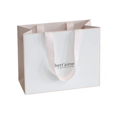 Bon prix Sacs en papier blancs imprimés écologiques, mini sacs de cadeau pour des achats d'affaires en ligne