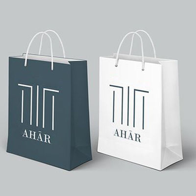 Bon prix le cadeau réutilisé par 250gsm met en sac de grands sacs en papier blancs personnalisés biodégradables en ligne
