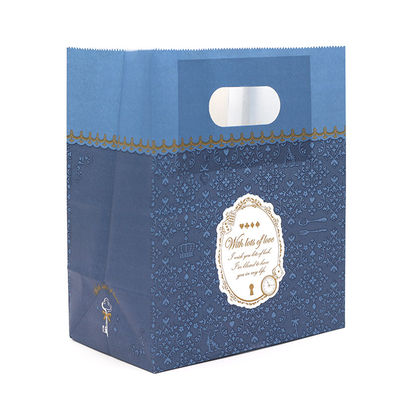 Bon prix Sacs à provisions de papier imprimés par coutume de papier découpés avec des matrices de sac de poignée pour des vêtements en ligne